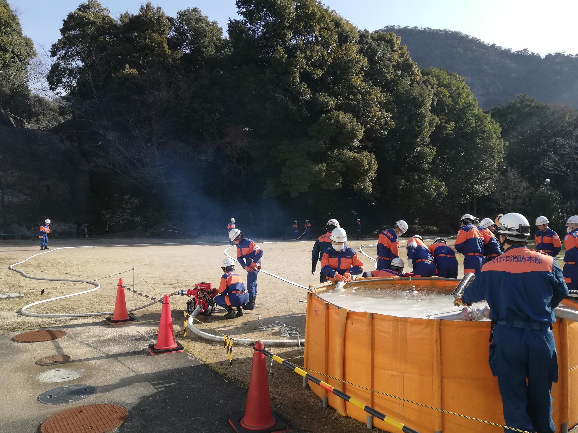 消防団春季訓練：連携中継送水訓練